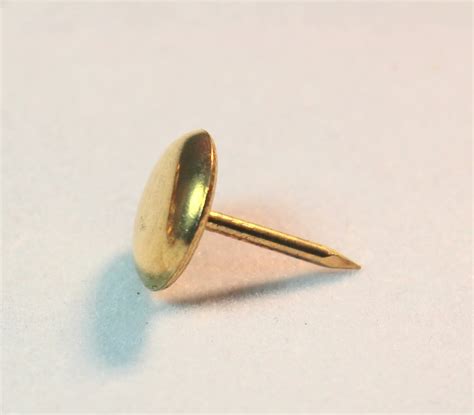 brass upholstery studs